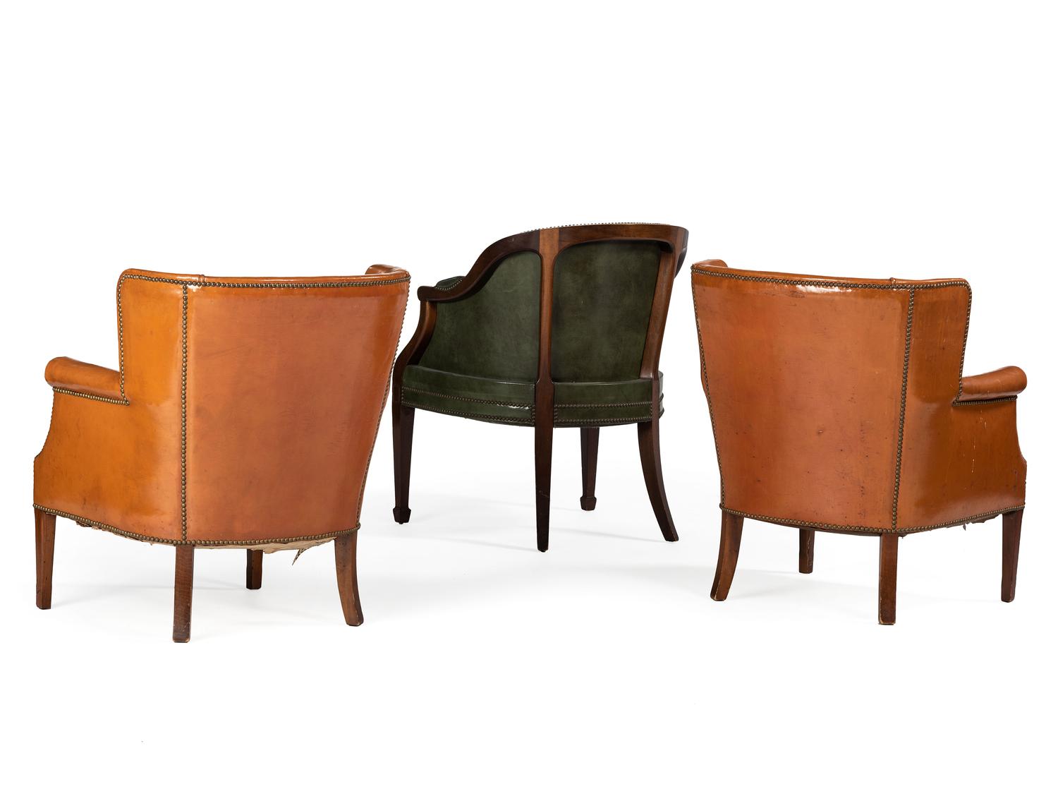 Three Leather Upholstered Armchairs