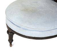 A Victorian Ebonized and Gilt Decorated Tête-à-Tête