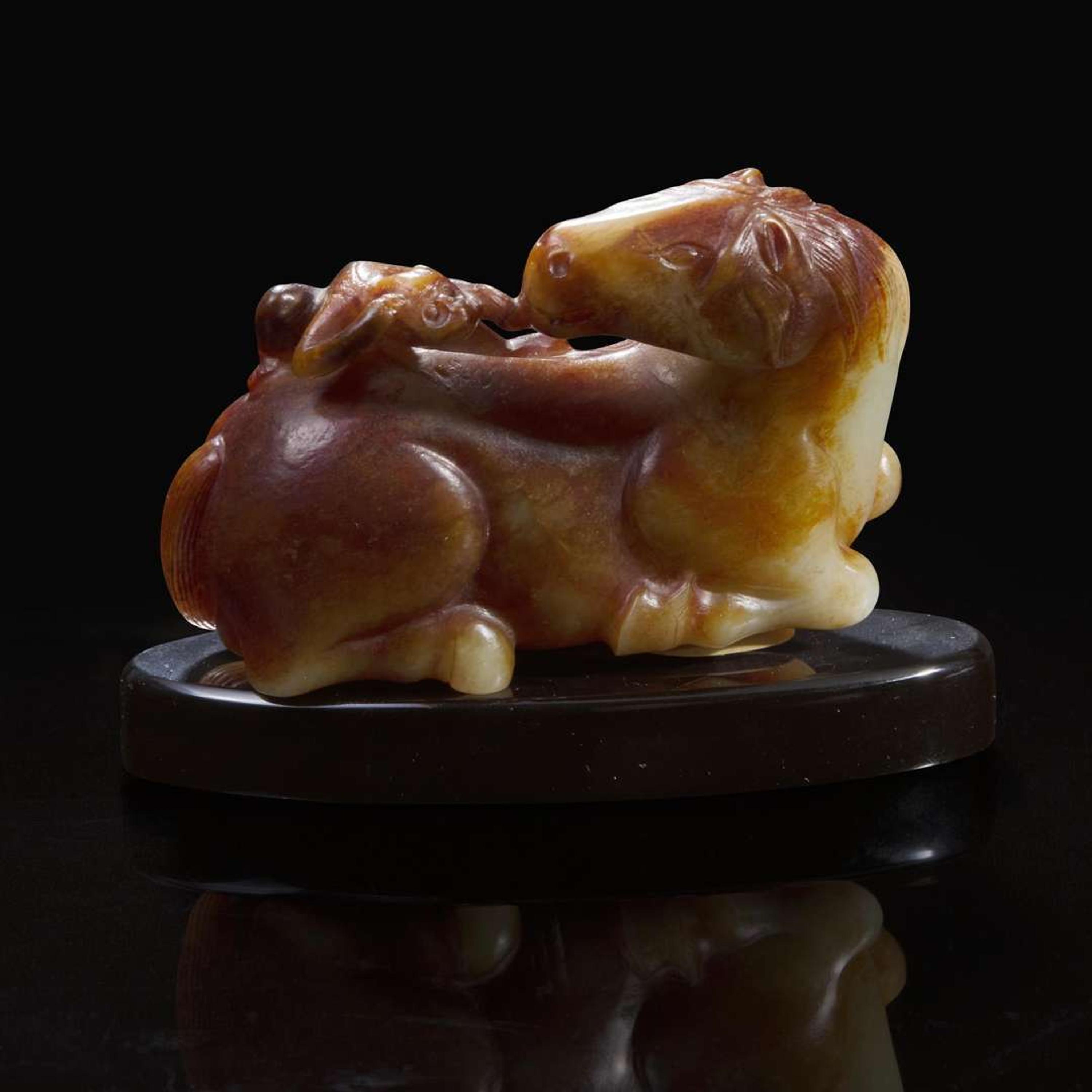 A Chinese yellowish and russet jade "Horse and Monkey" group 马上封”猴“玉雕 18th century or later ???????