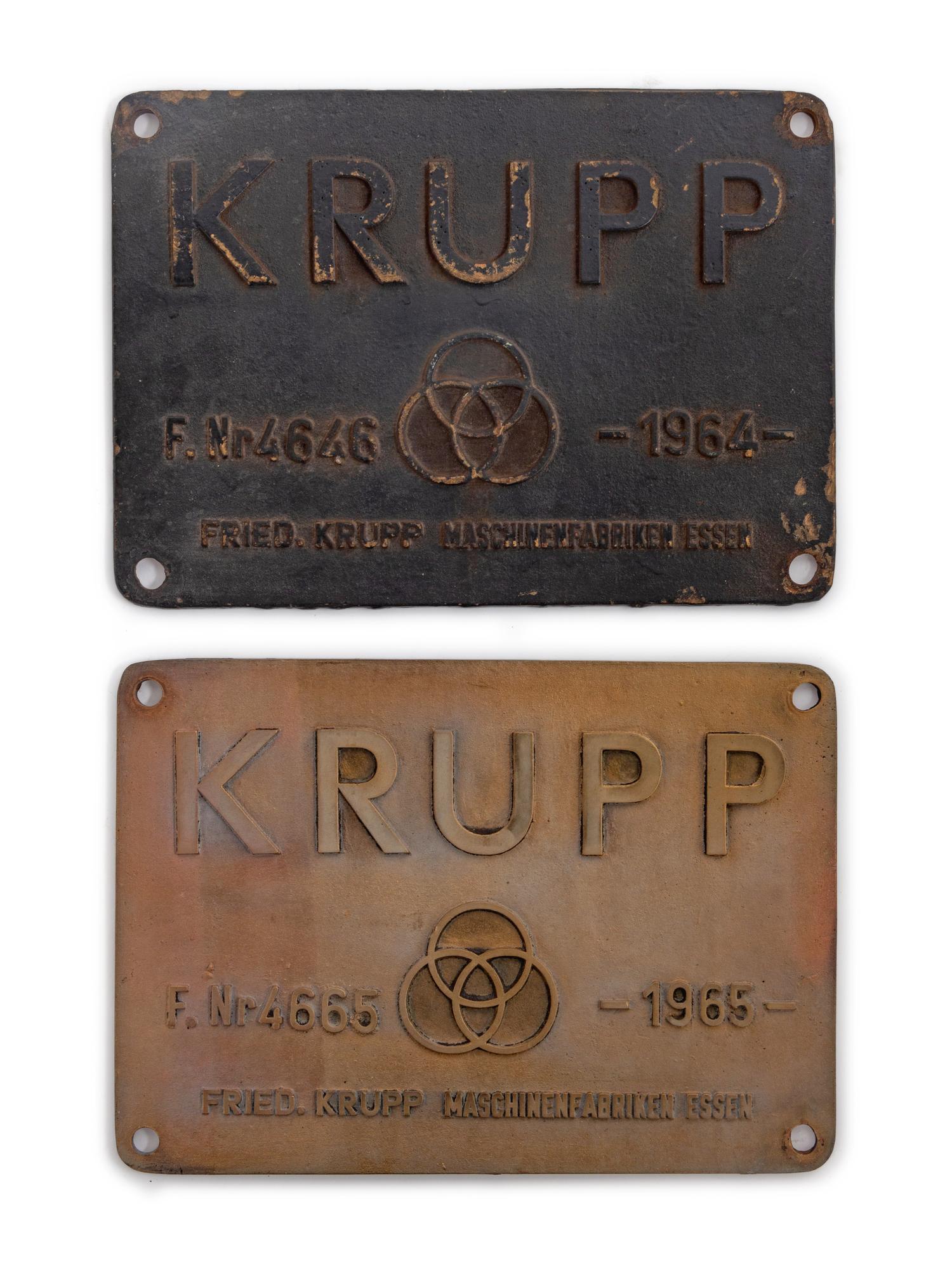 Two Metal Krupp Maschinenfabriken Locomotive Badges