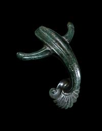 A Greek Bronze Hydria Handle
