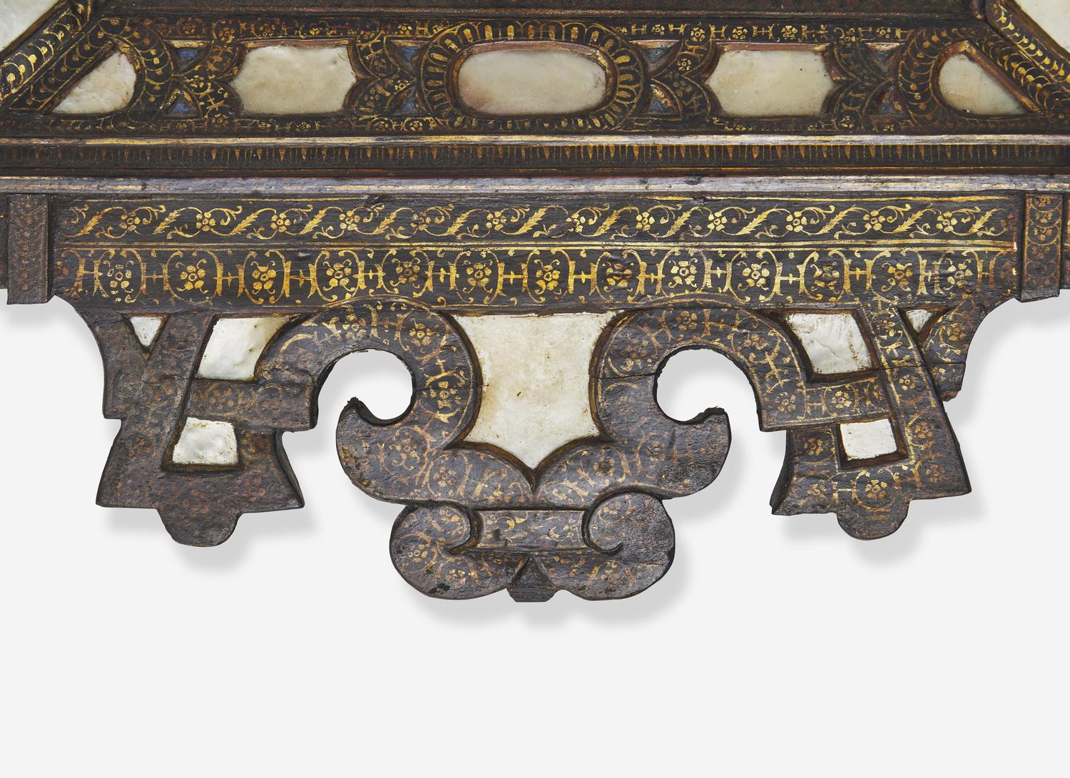 A North Italian Mother-of-Pearl Inlaid, Parcel Gilt and Black Lacquered Mirror