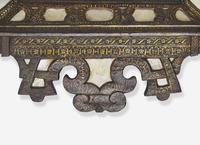 A North Italian Mother-of-Pearl Inlaid, Parcel Gilt and Black Lacquered Mirror