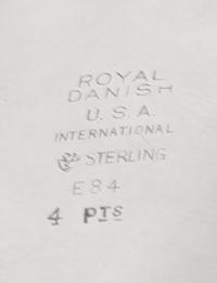 An American Silver Pitcher, International Silver Co., Meriden, CT, in the Royal Danish pattern, of baluster form, the handle having ban