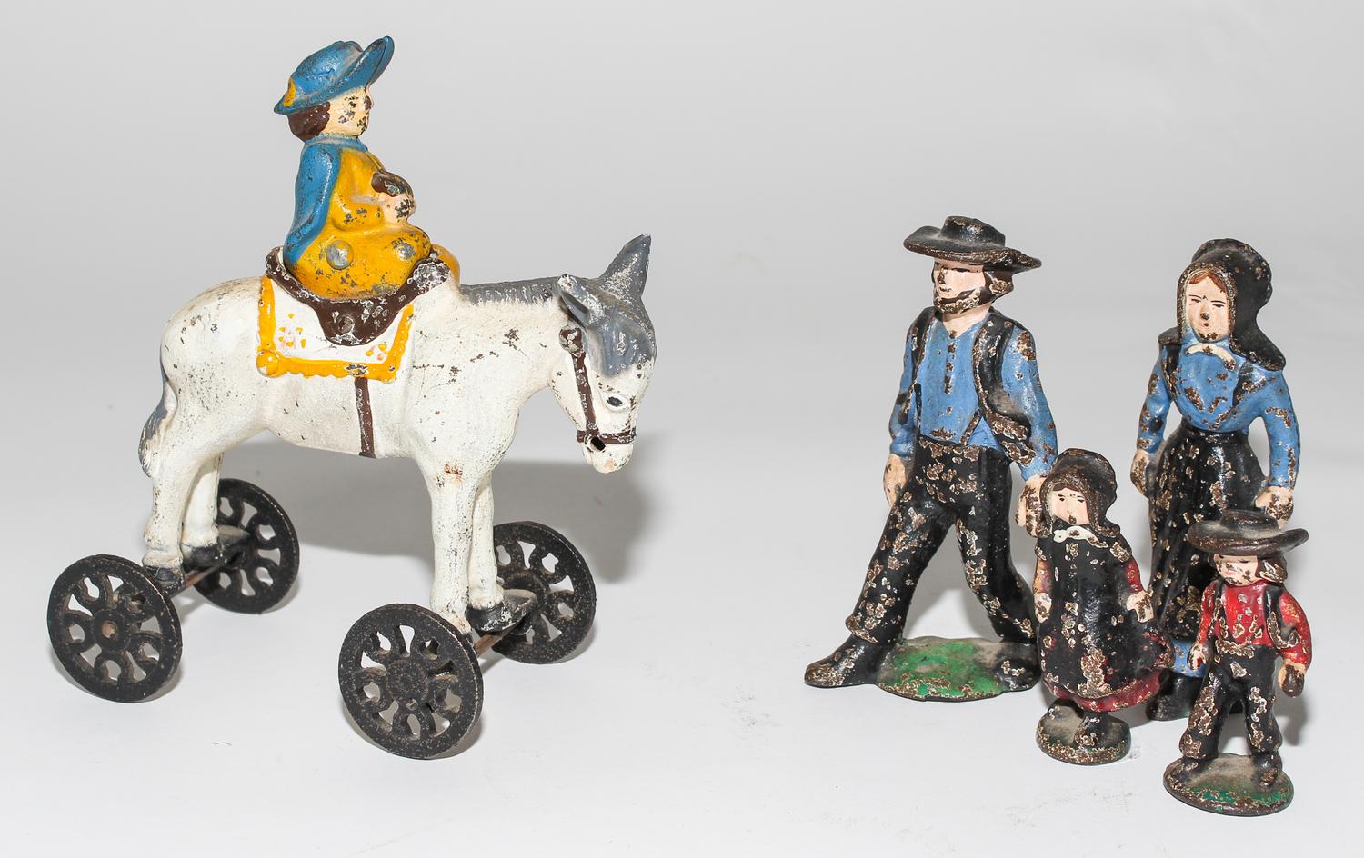 A Collection of Five Painted Pewter Figures Height of tallest 6 1/2 inches.