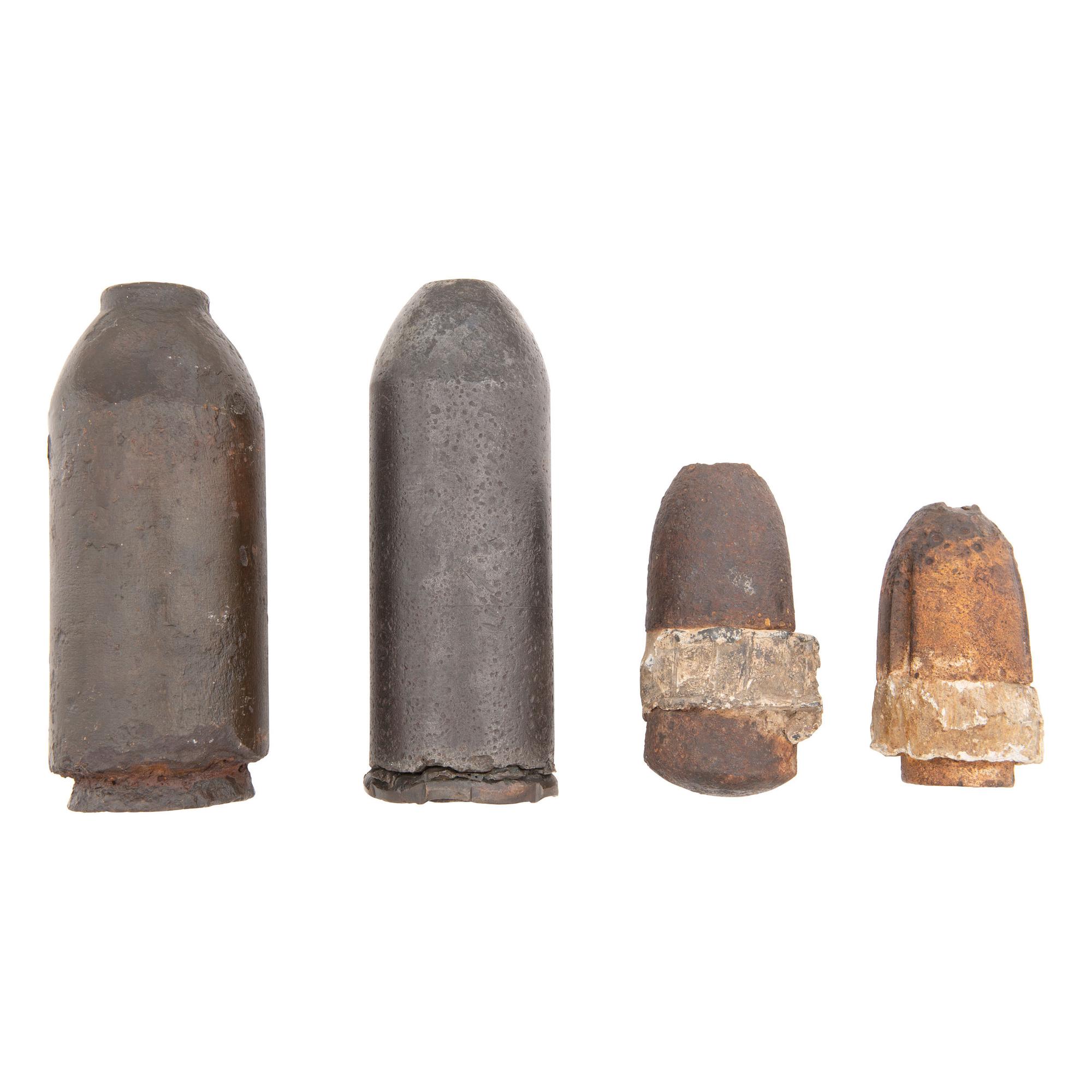 Four Excavated Civil War Artillery Shells: #30 Parrott Bolt, #20 Parrott Shell and Two Hotchkiss