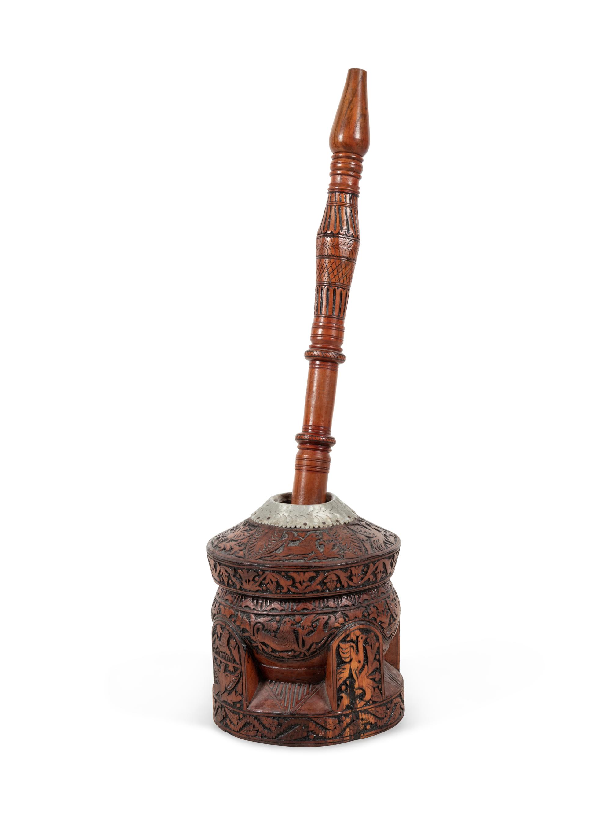 A Carved Walnut Coffee Mortar and Pestle