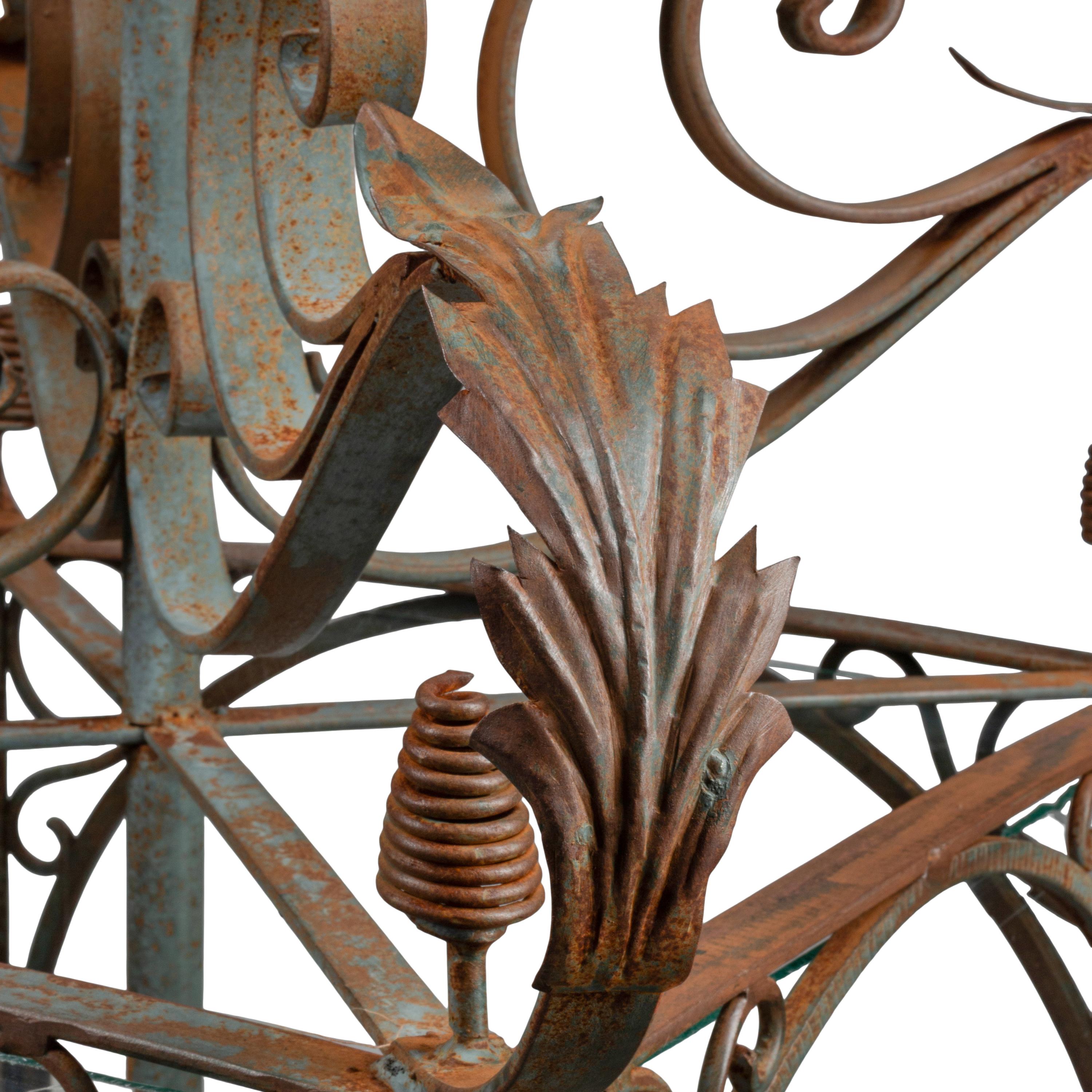 A Pair of Spanish Iron and Etched Glass Hall Lanterns