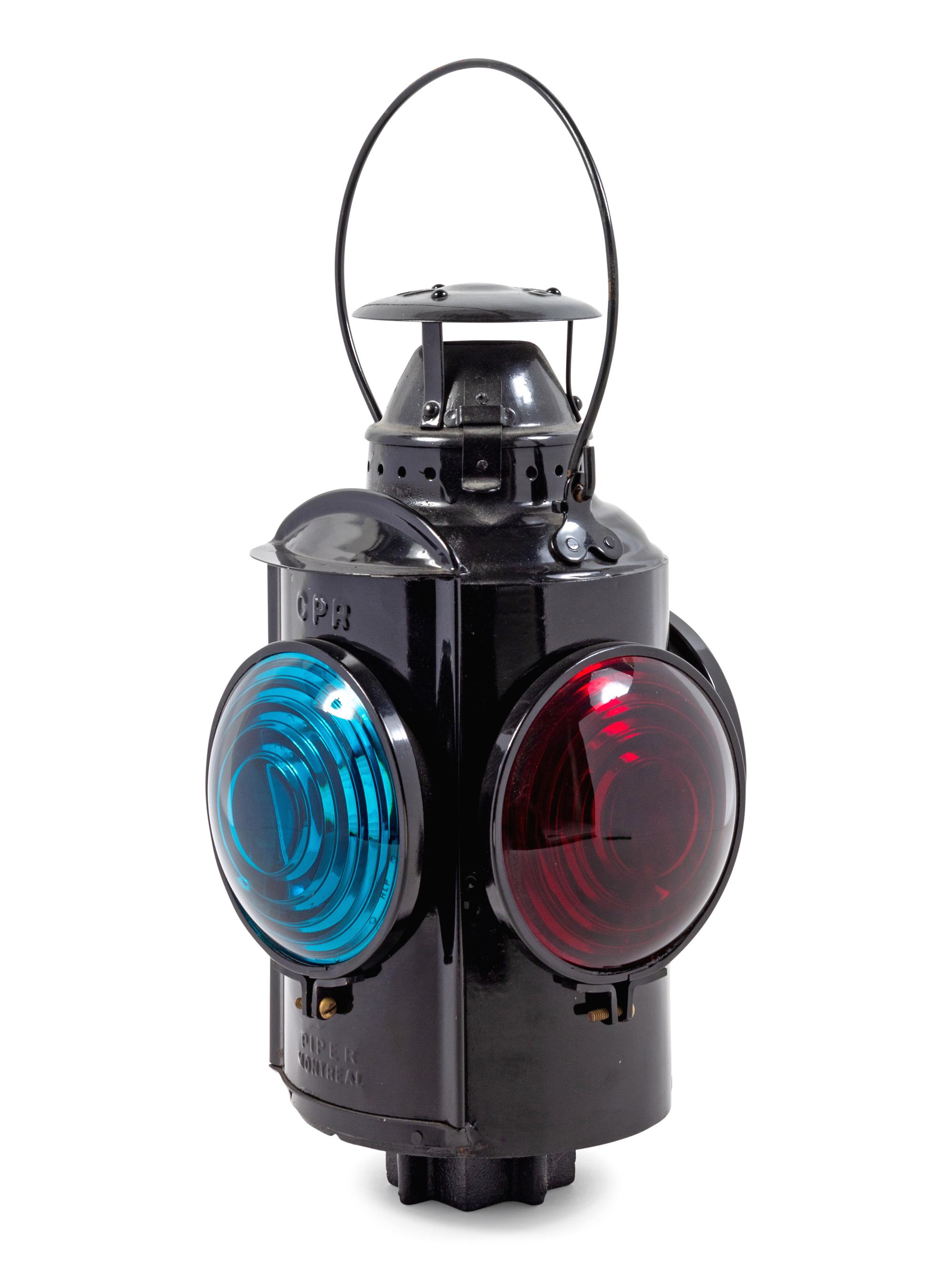 A Painted Metal Central Pacific Railway Four-Light Railroad Lantern