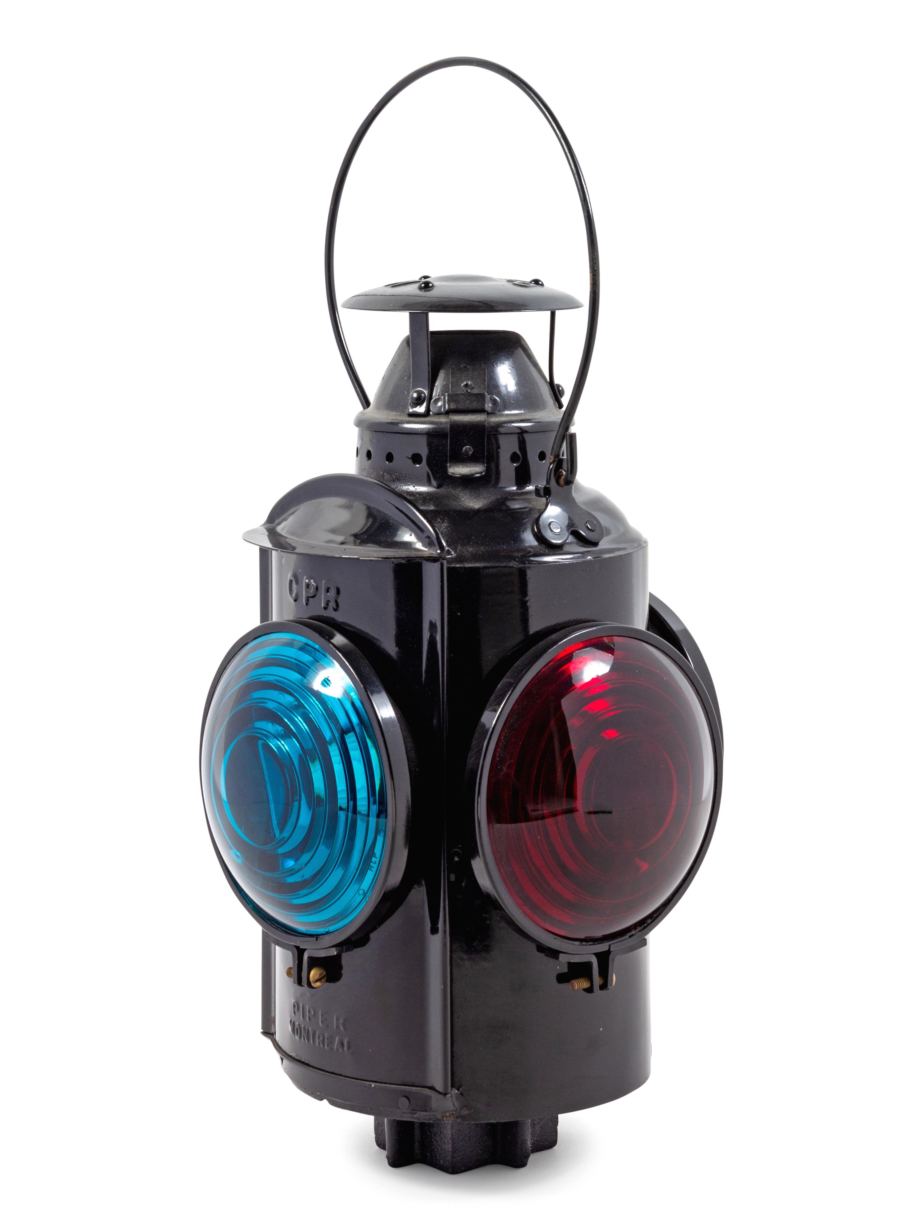 A Painted Metal Central Pacific Railway Four-Light Railroad Lantern