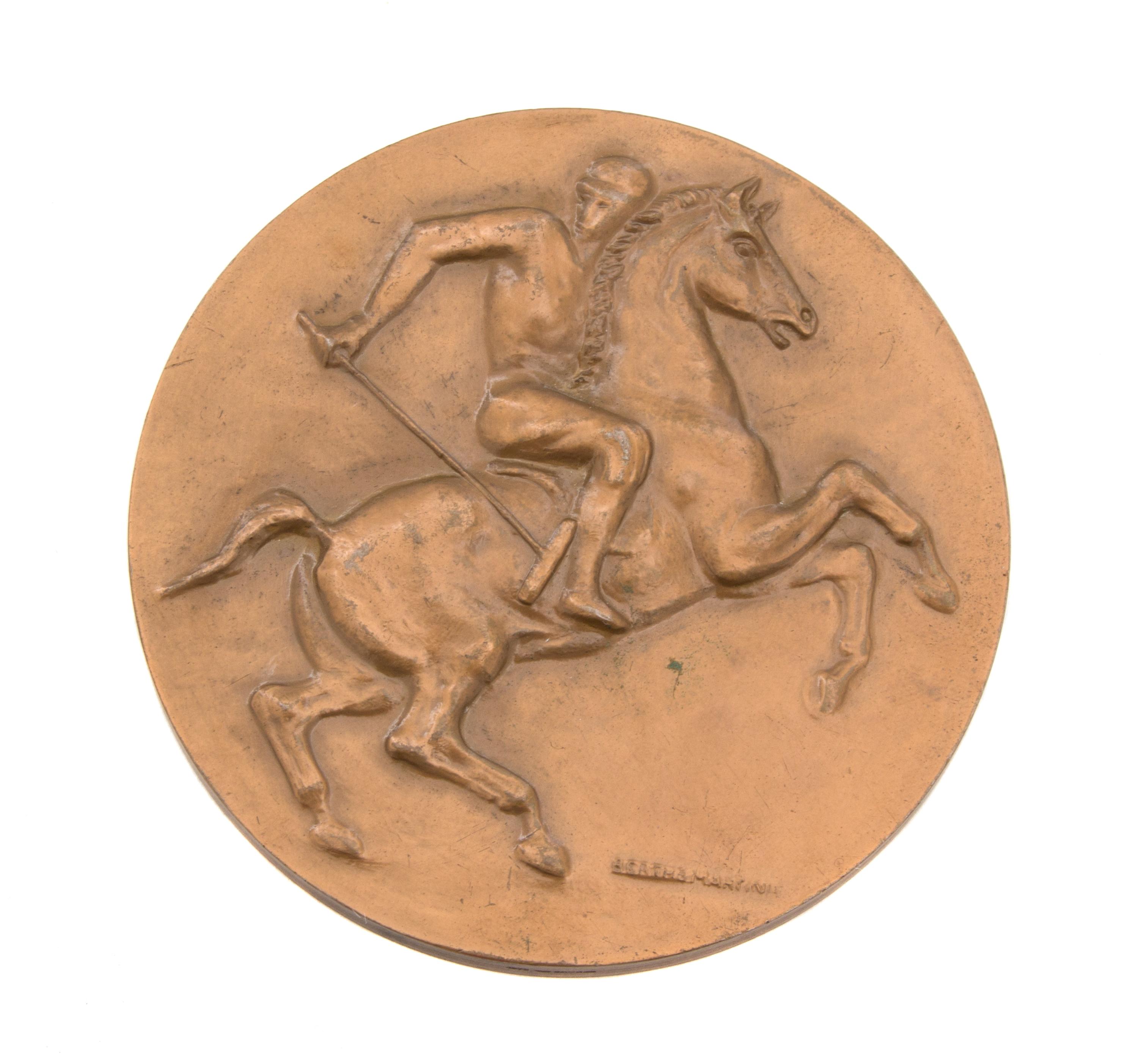 Berthe Martinie, (French, 1883-1958), Polo Medallion, having a polo player on pony on face and polo mallets on verso