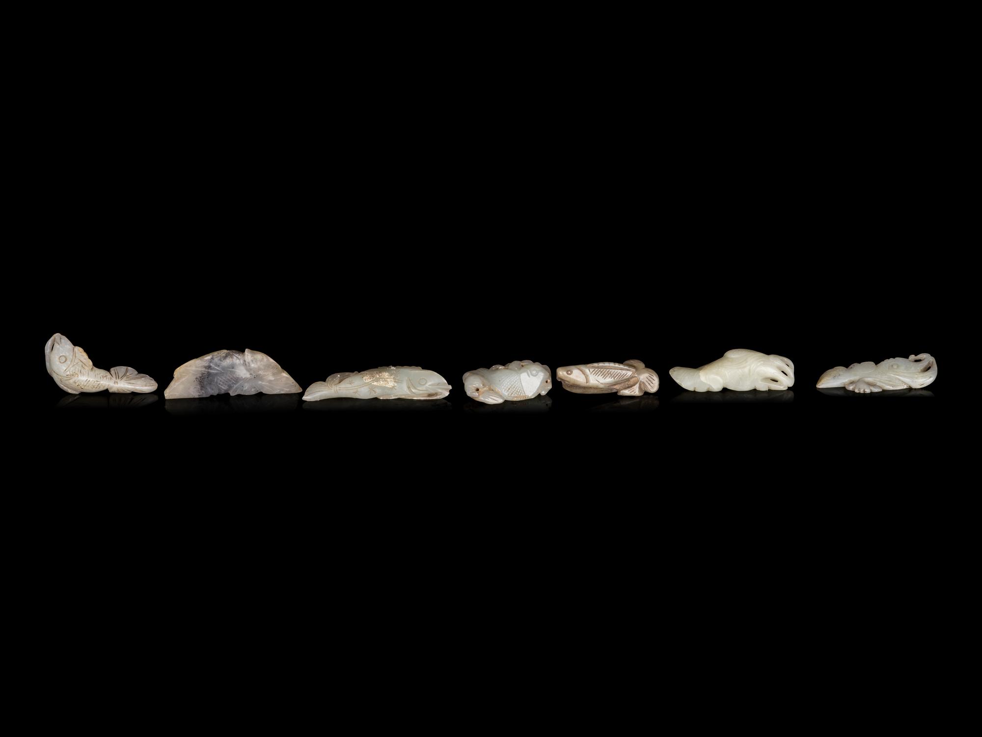Seven Chinese Celadon Jade Carvings of Fish