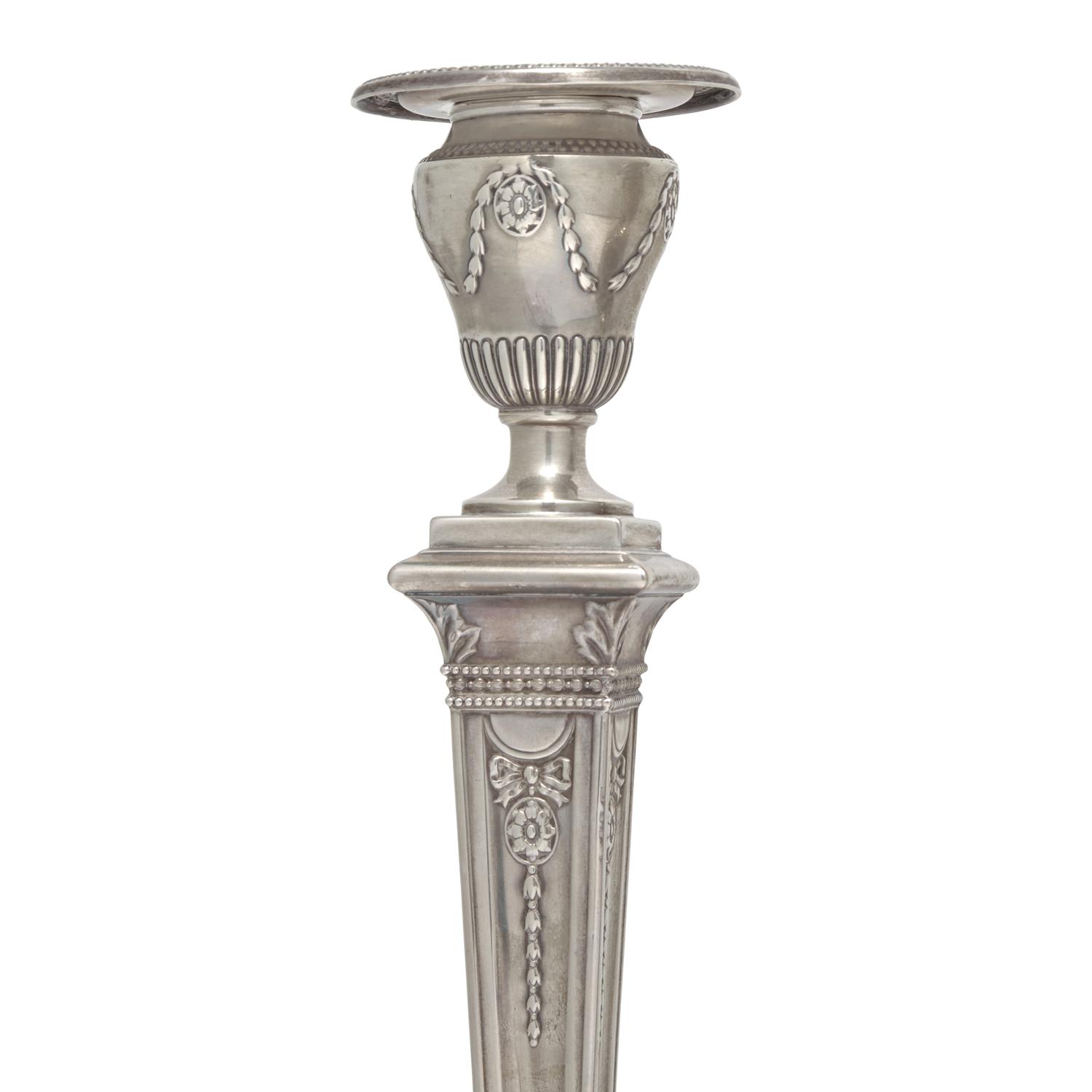A Set of Six Neoclassical Style Weighted Sterling Silver Candlesticks