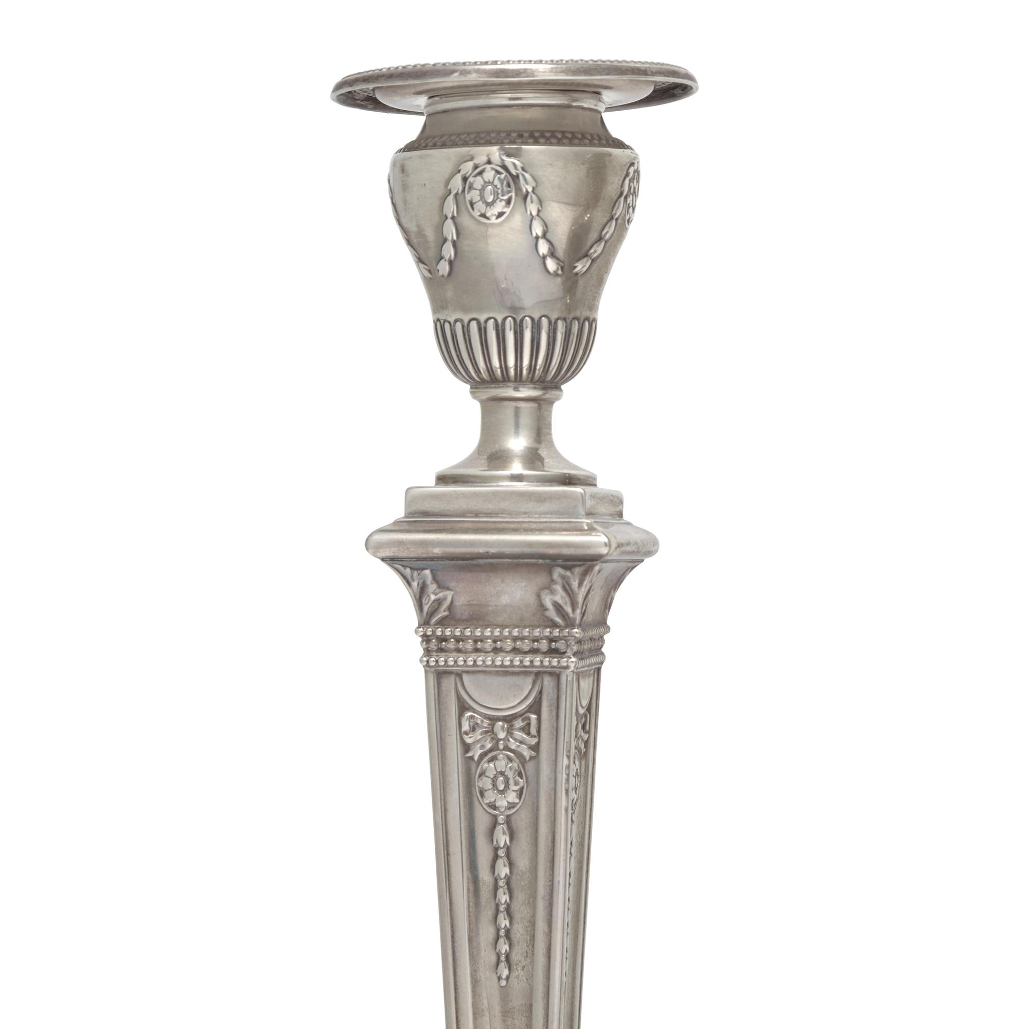 A Set of Six Neoclassical Style Weighted Sterling Silver Candlesticks