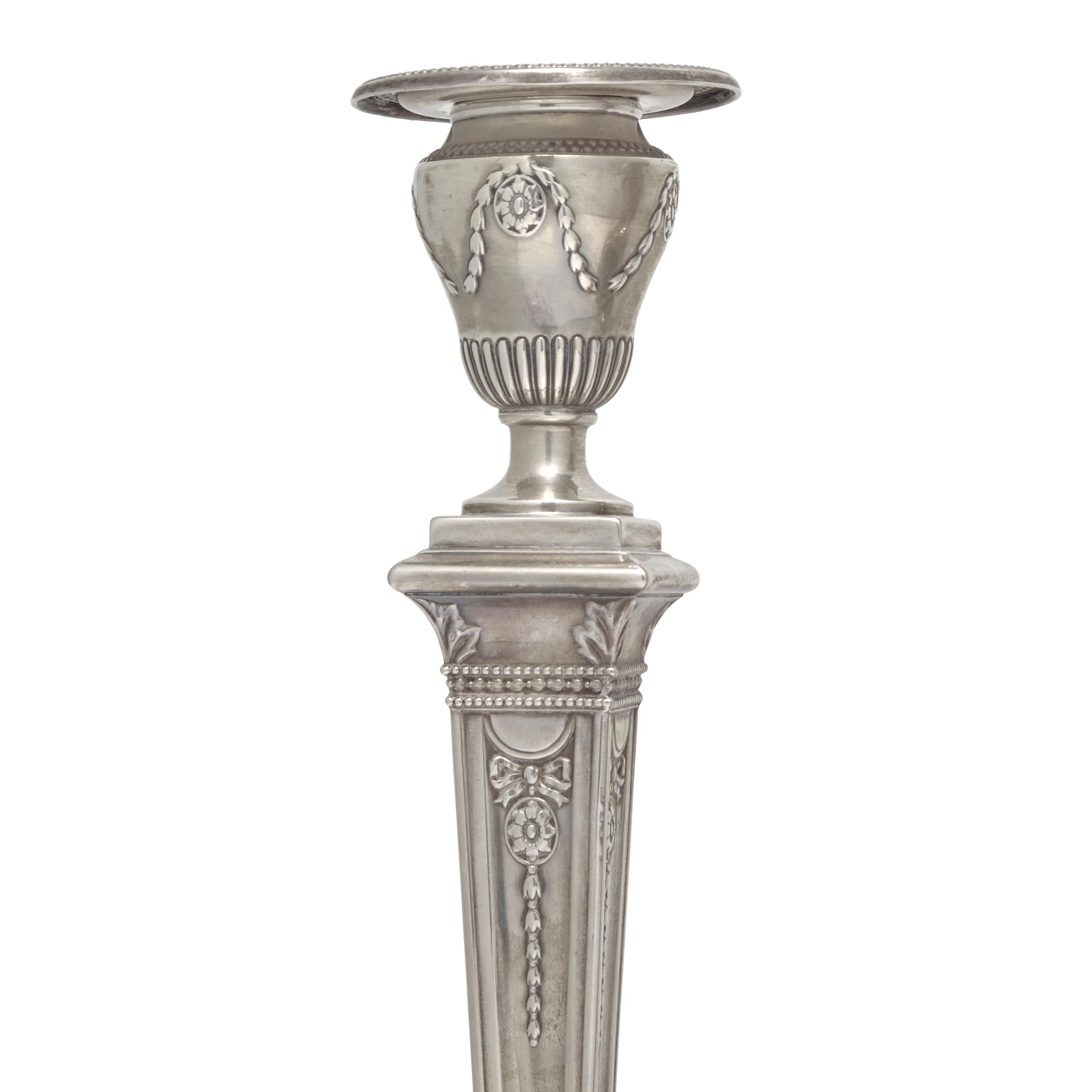 A Set of Six Neoclassical Style Weighted Sterling Silver Candlesticks
