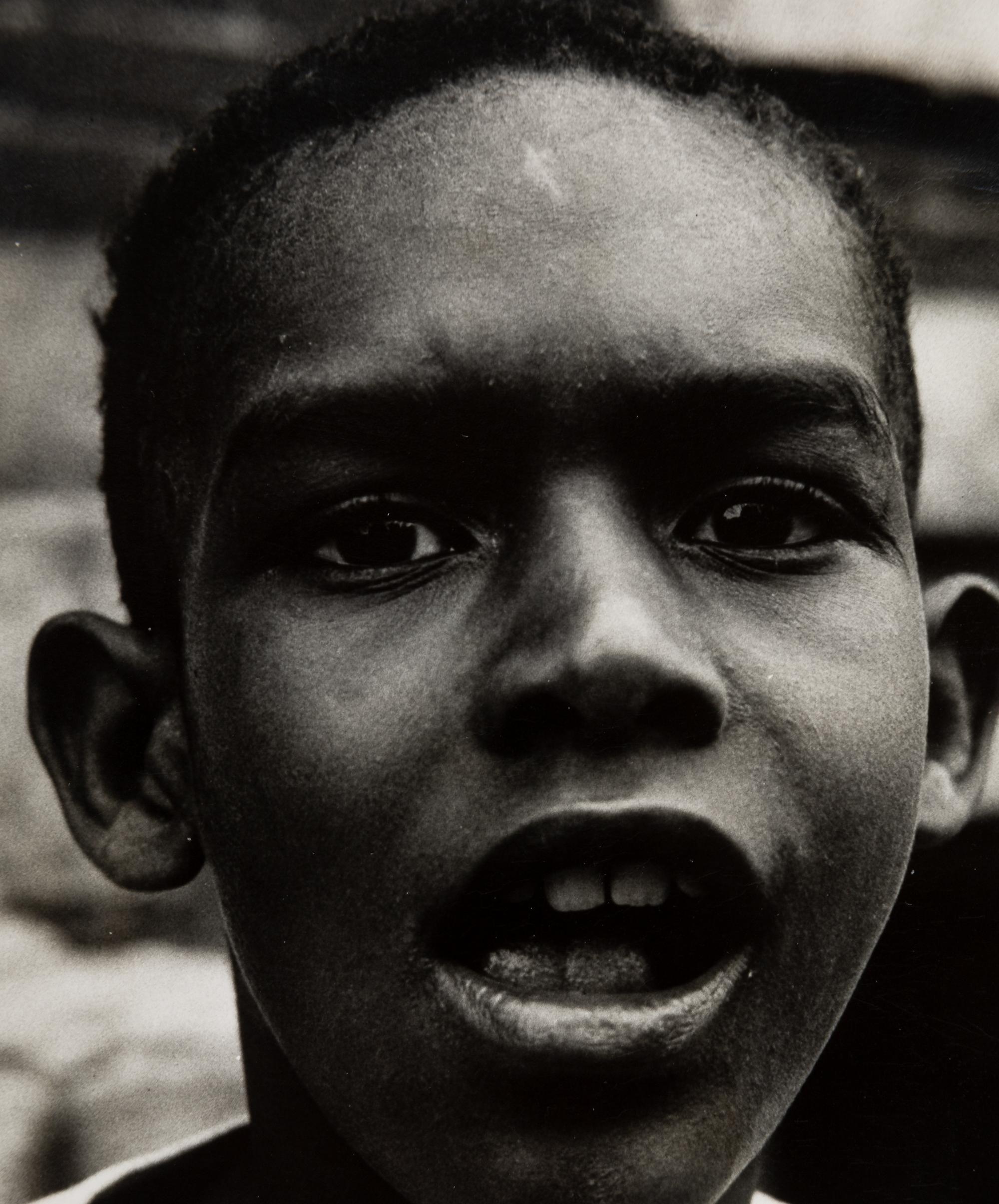 [PHOTOGRAPHY]. 2 photos of young Black subjects, incl. Boy, from "Harlem Document" by Aaron Siskind.