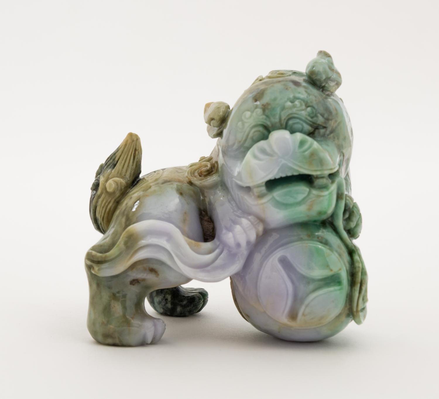 A Chinese Jadeite Figure of a Fu Lion Height 4 inches.