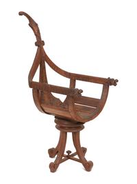 An Italian Carved Mahogany Gondola Chair with Swivel Seat