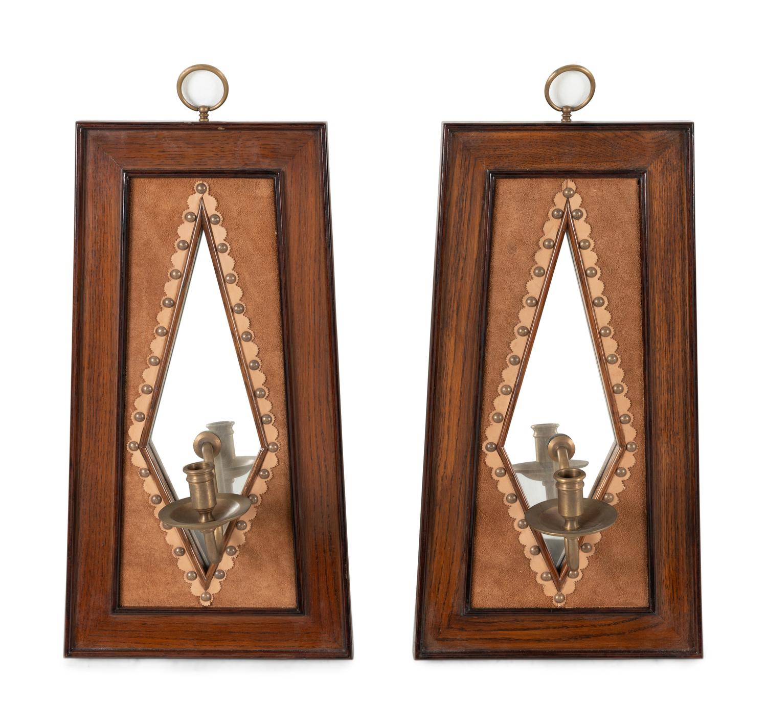 A Pair of Brass Mounted Suede-Inset Oak Mirrored Sconces