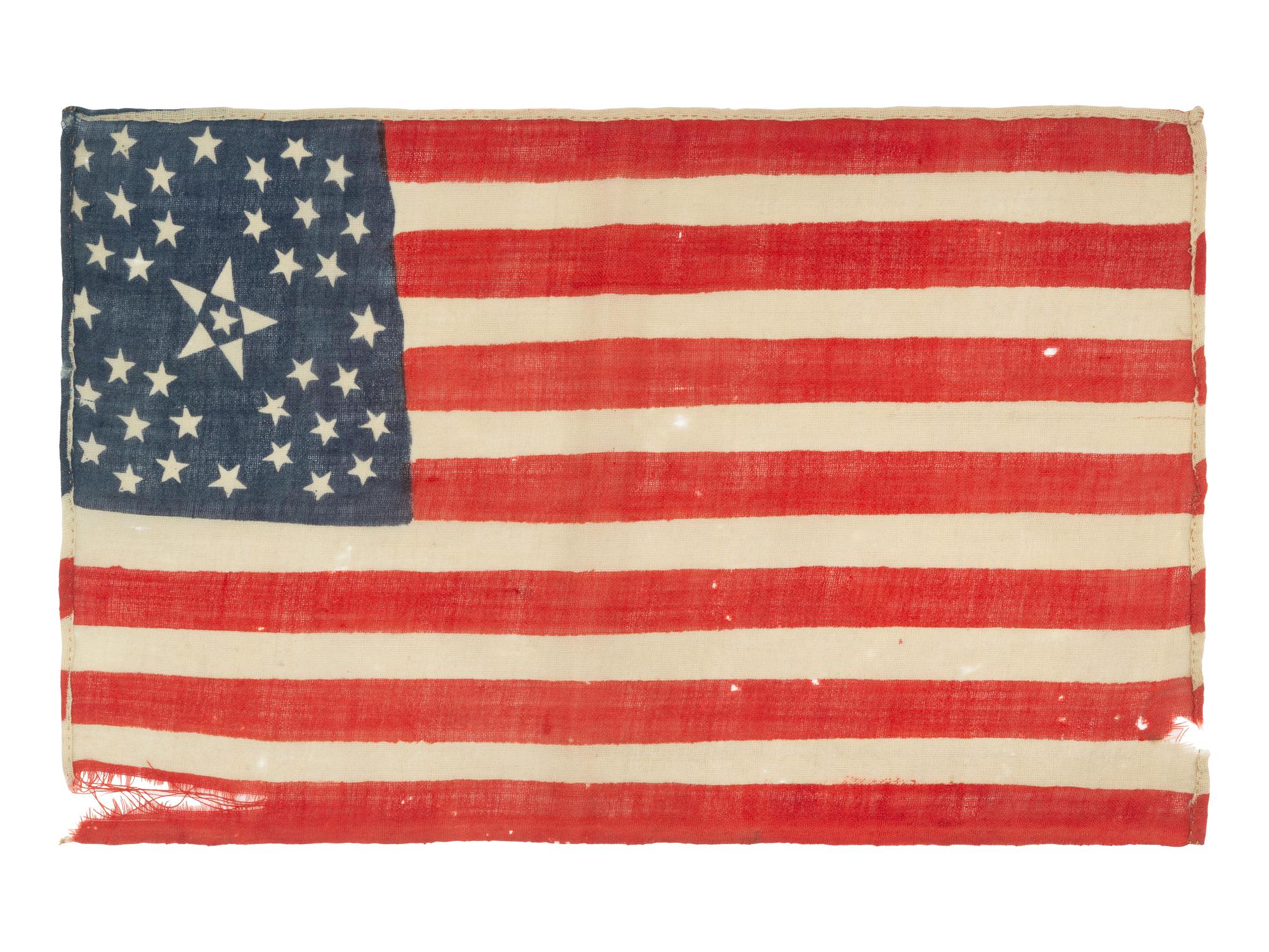 [FLAGS]. 38-star American parade flag with floral star pattern. Ca 1876.