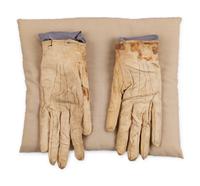 [LINCOLN ASSASSINATION]. A pair of stained leather gloves carried by President Abraham Lincoln at Ford's Theatre on the night of his assassination, 14 April 1865.