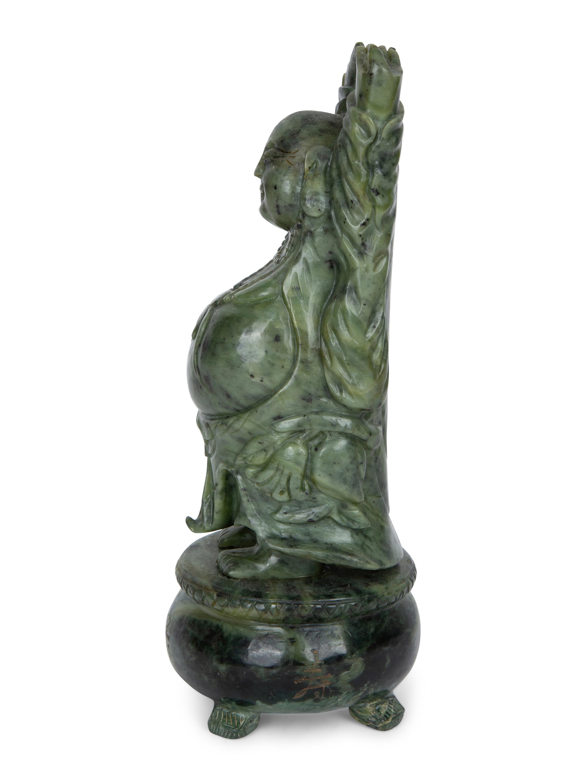 A Chinese Carved Spinach Jade Laughing Buddha — 20TH CENTURY