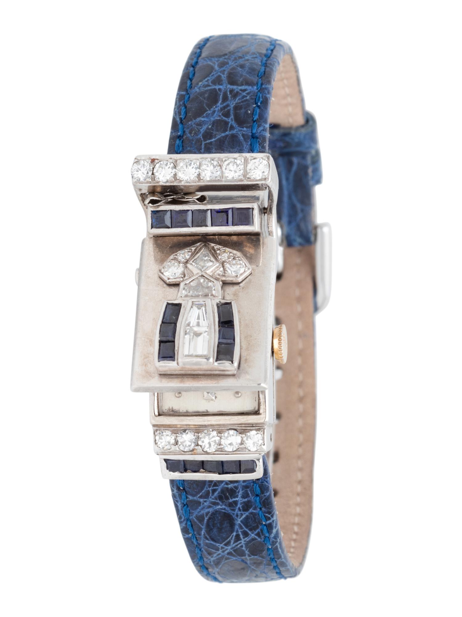BULOVA, WHITE GOLD, DIAMOND AND SAPPHIRE SURPRISE WRISTWATCH