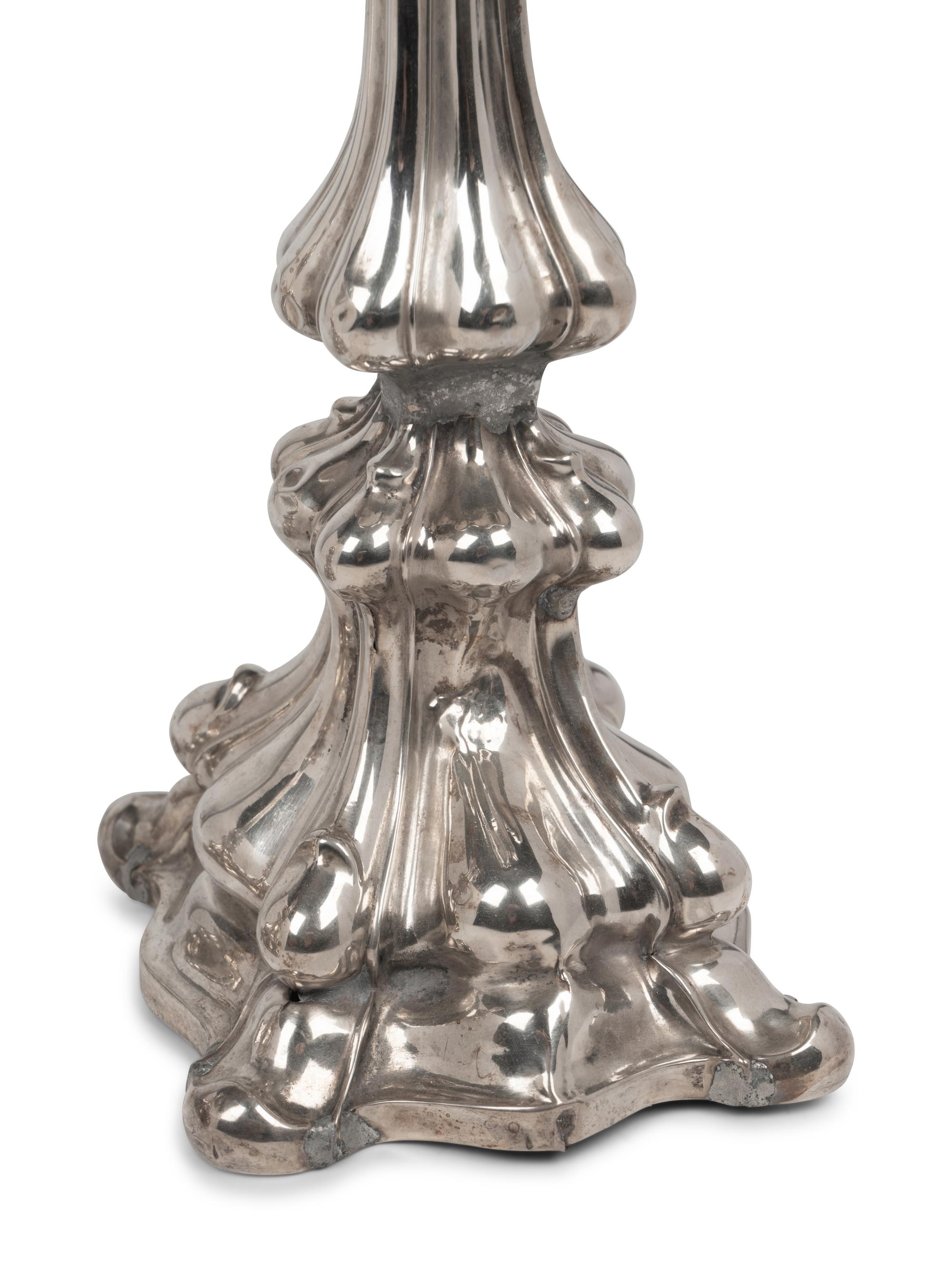 A Pair of Continental Silver-Plate Candlesticks