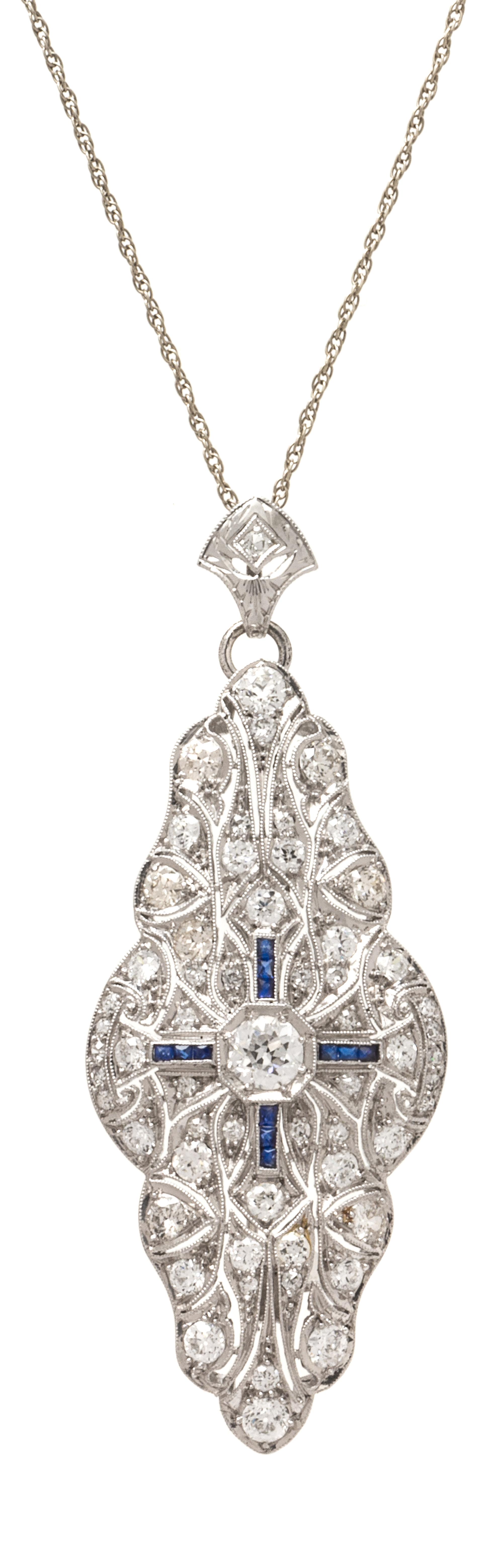An Art Deco Platinum, Diamond and Sapphire Pendant/Brooch, 7.85 dwts.