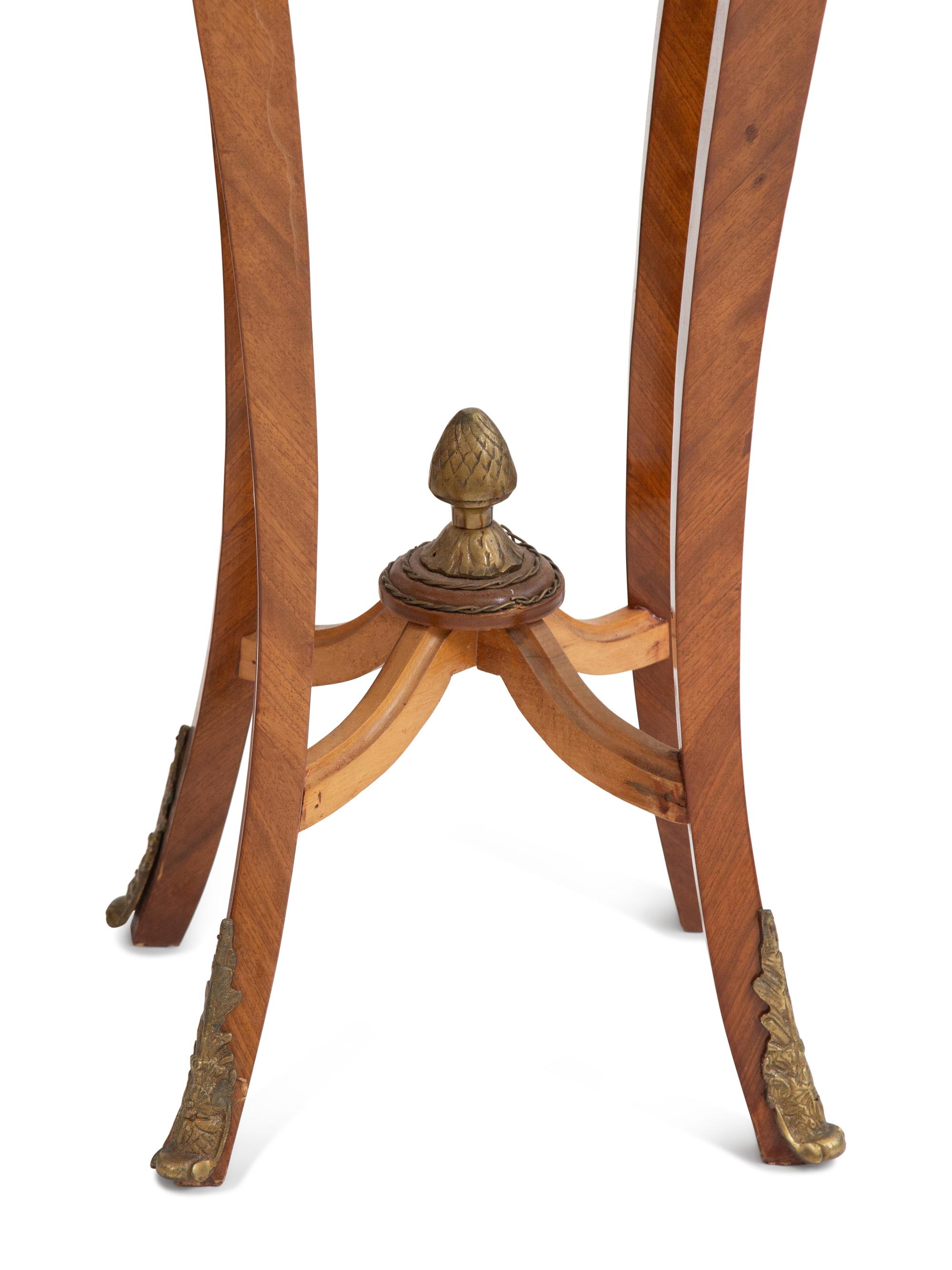 A Pair of Louis XV Style Gilt Metal Mounted Marble-Top Pedestals