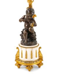 A Pair of Louis XVI Style Gilt and Patinated Bronze Six-Light Figural Candelabra