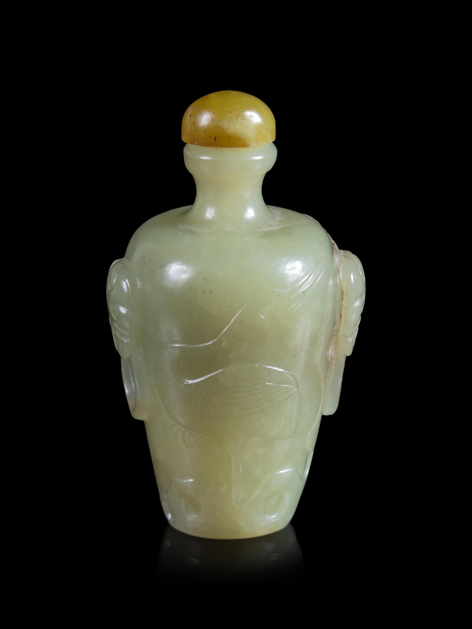 A Carved Yellow Jade 'Crane and Pine' Snuff Bottle