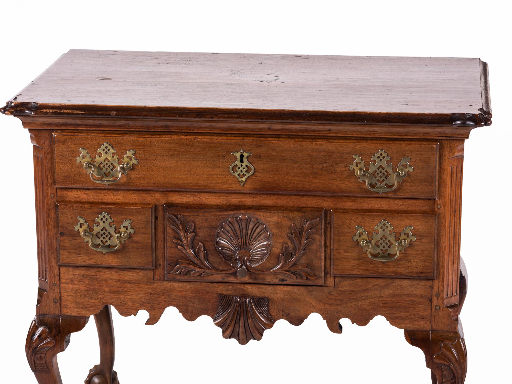 A Chippendale Style Carved Walnut Claw-and-Ball Foot Dressing Table — LIKELY LATE 19TH/EARLY 20th CENTURY INCORPORATING EARLIER ELEMENTS