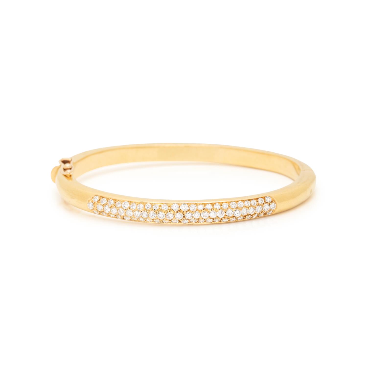 CARTIER, YELLOW GOLD AND DIAMOND BANGLE BRACELET