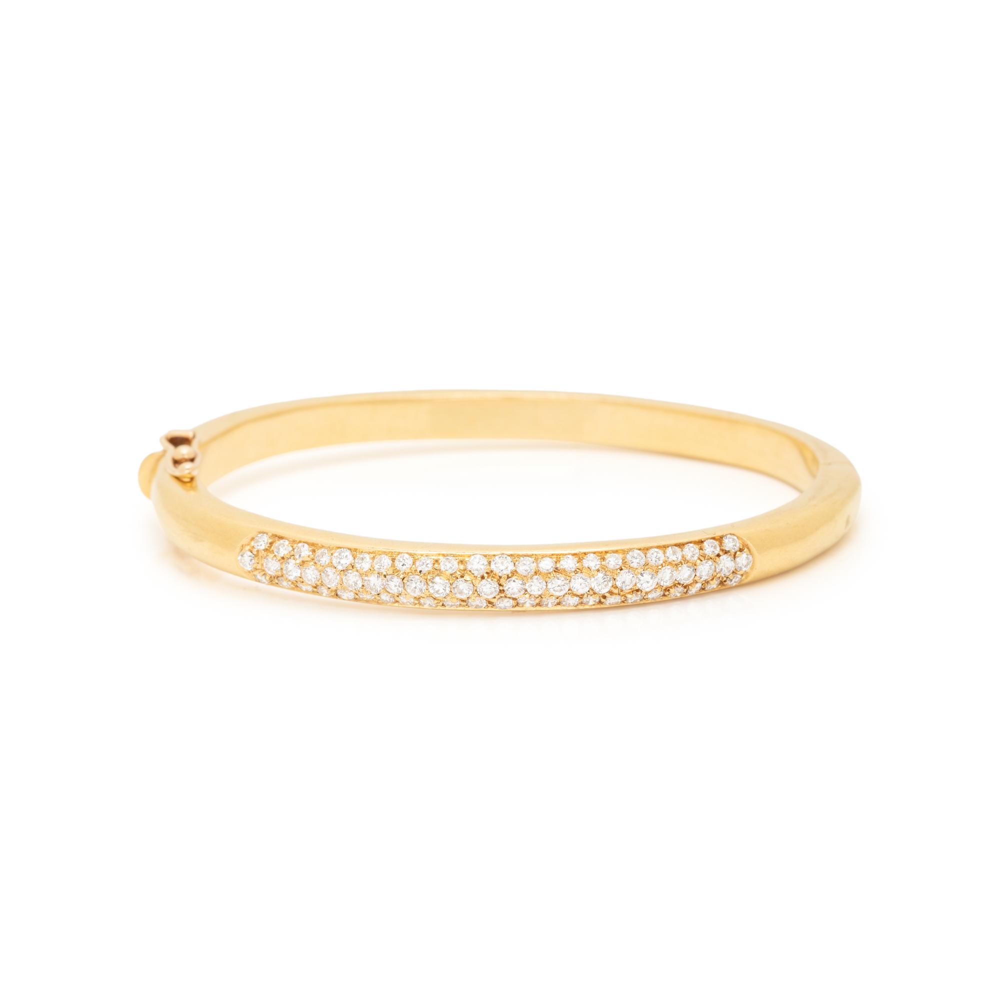CARTIER, YELLOW GOLD AND DIAMOND BANGLE BRACELET
