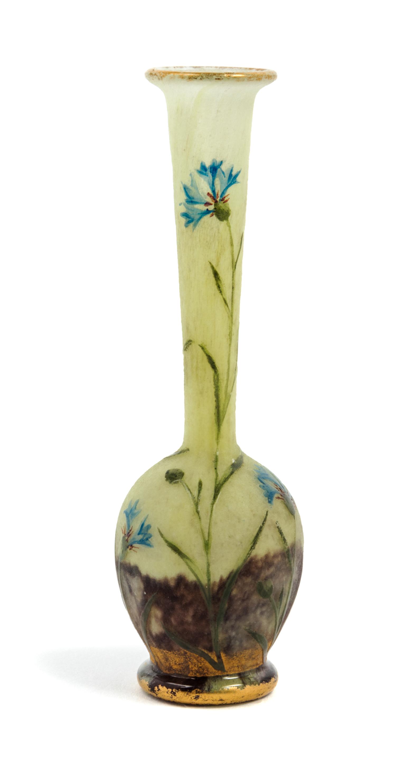 Daum, EARLY 20TH CENTURY, a miniature enameled cameo glass cabinet vase, of bottle form decorated with flowers in a landscape
