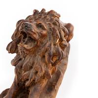 A Carved Oak Model of a Lion