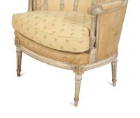A Pair of Louis XVI Style Painted and Upholstered Bergeres — 20TH CENTURY