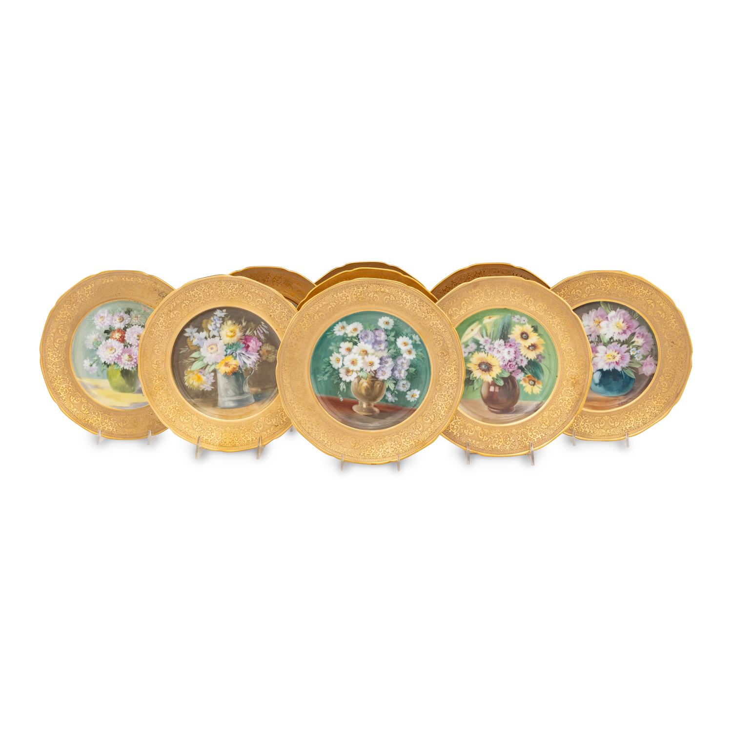 A Set of Sixteen Continental Gilt and Polychrome Painted Cabinet Plates