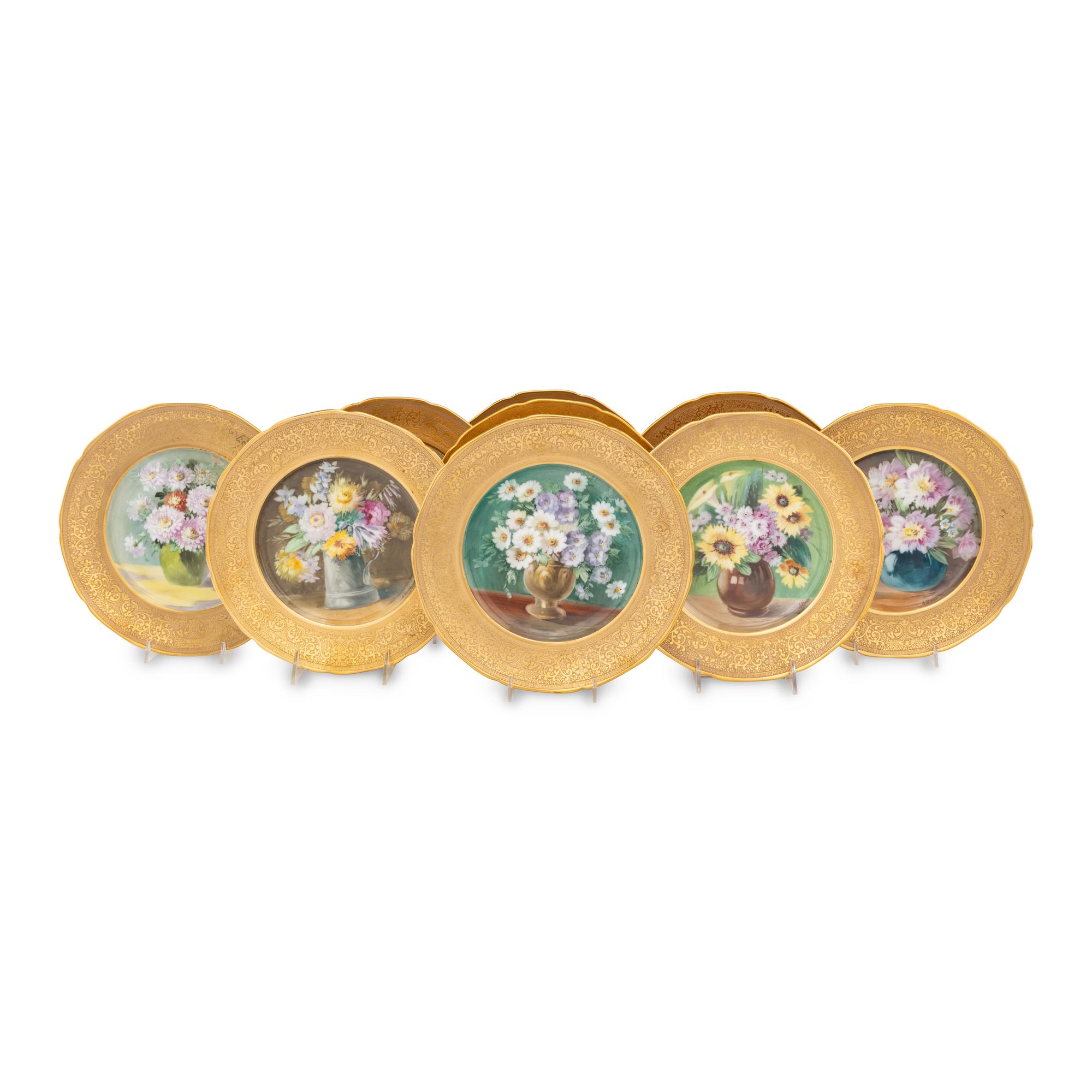 A Set of Sixteen Continental Gilt and Polychrome Painted Cabinet Plates