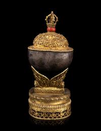 A Tibetan Coral Inset Silver and Gilt Bronze Kapala Bowl