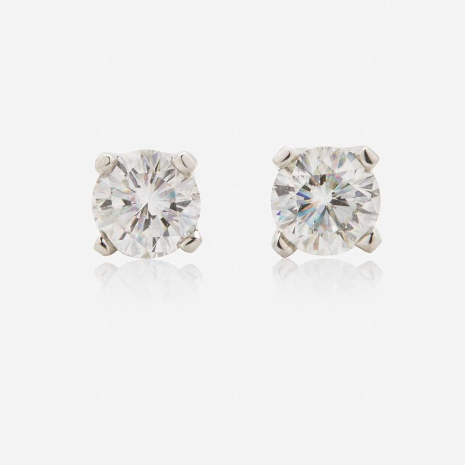 A Pair of 14K White Gold and Diamond Stud Earrings