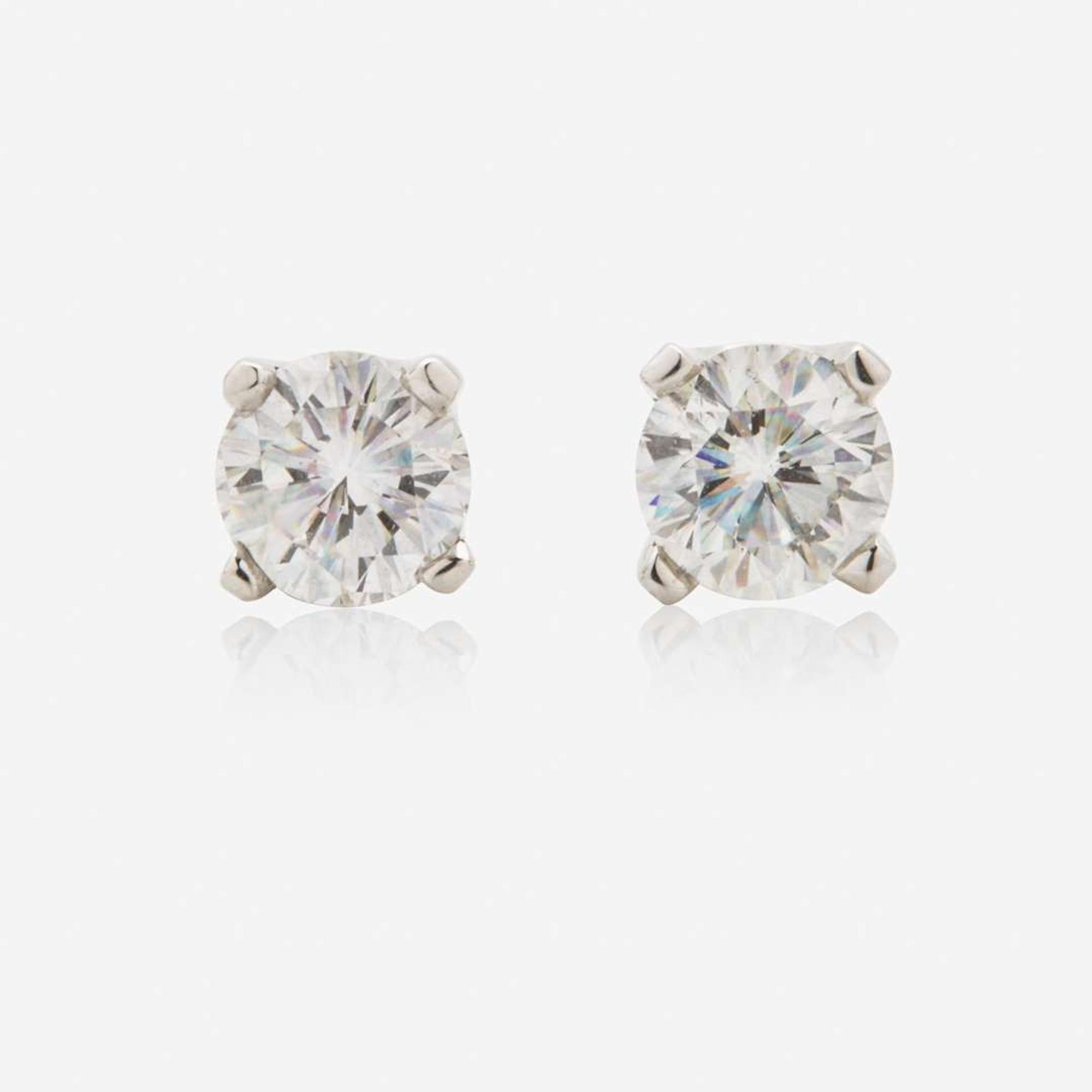 A Pair of 14K White Gold and Diamond Stud Earrings