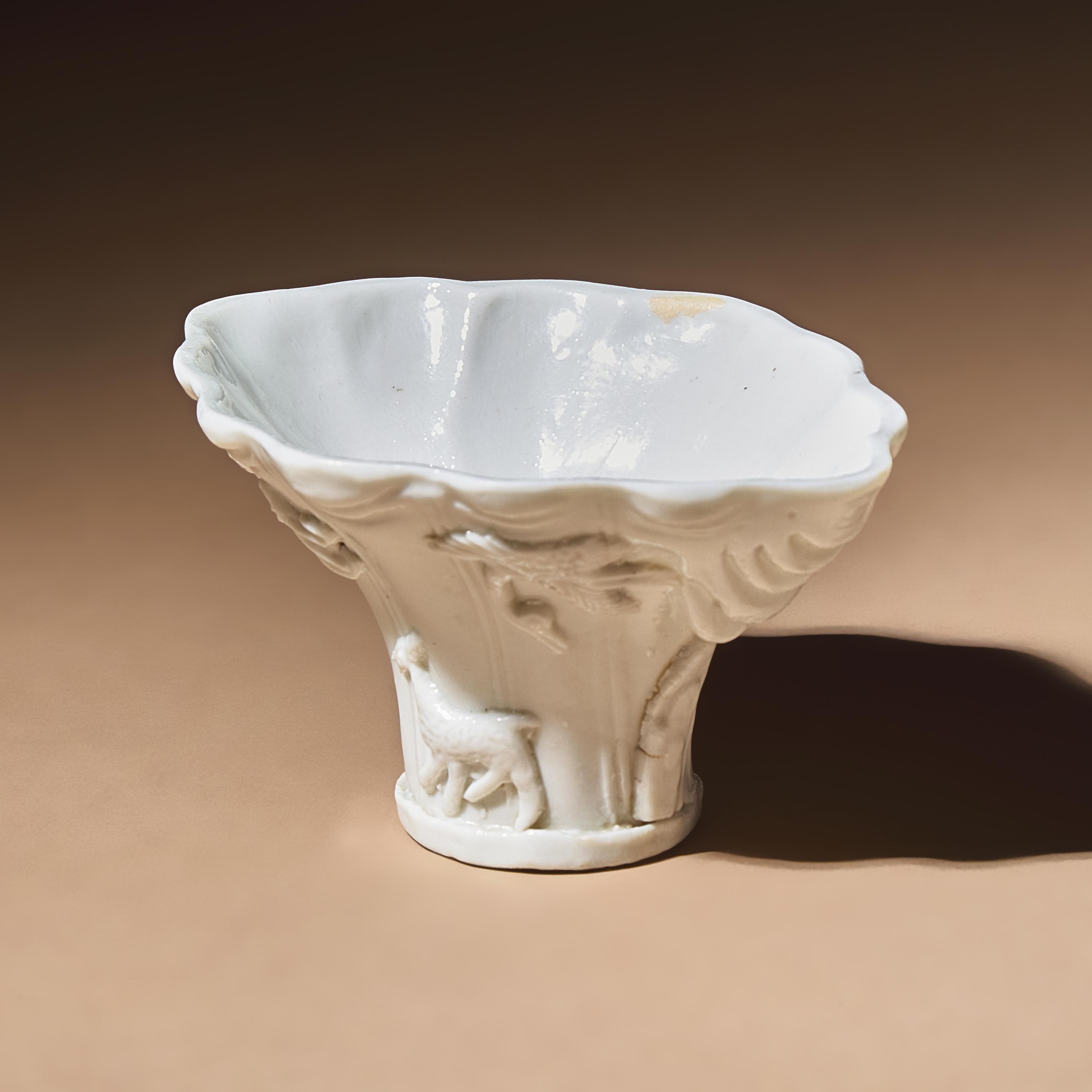 A Chinese Blanc-de-Chine Porcelain Libation Cup, 17th-Early 18th Century — 清早期 德化白瓷貼塑鹿鶴同春杯