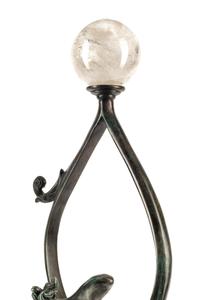 A Continental Patinated Bronze Figure with a Rock Crystal Ornament