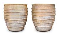 A Pair of Concrete Planters Height 24 1/2 inches.