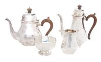 A George V Silver Four-Piece Tea and Coffee Service, Goldsmiths & Silversmiths, Co. Ltd., London, comprising a teapot, a coffee pot, a