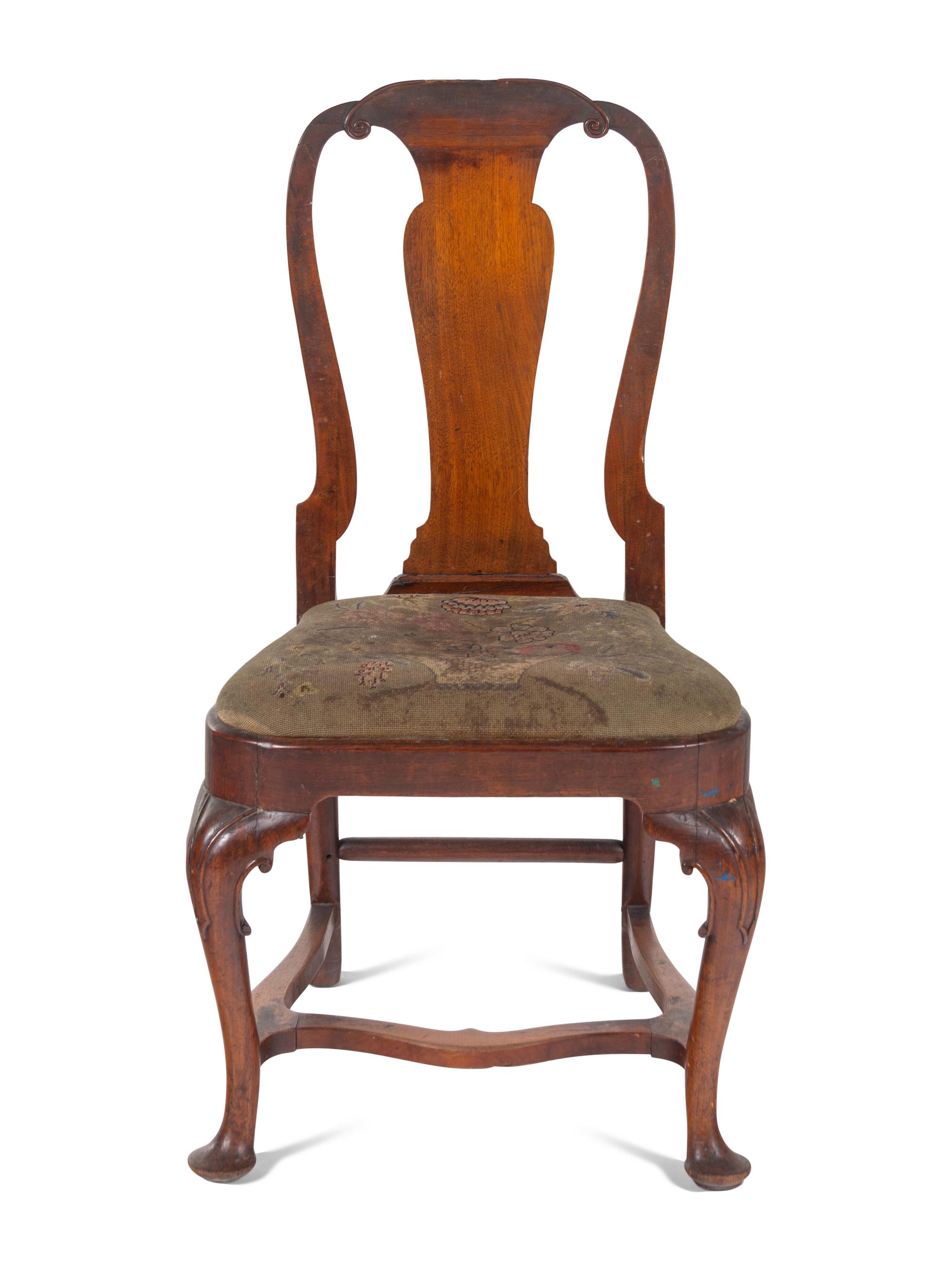 A Queen Anne Volute Carved Walnut Flat-Stretcher Pad-Foot Side Chair