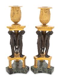 A Pair of French Egyptian Revival Bronze and Marble Candlesticks