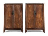 A Pair of Chinese Jichimu Cabinets on Stands
